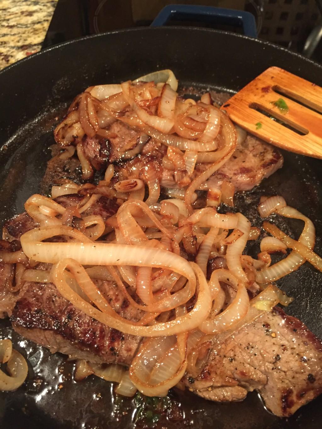 family dinner steak and onions brussels sprouts