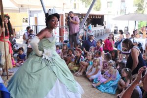 Princess Tiana singing to kids
