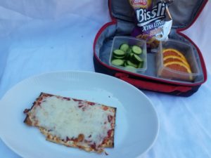 matzah pizza, cucumbers, Passover snack, and orange slices