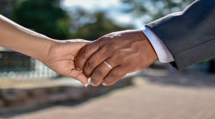 image of two hands holding each other
