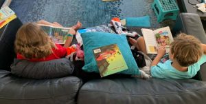 two kids reading books screen-free activities for your little early riser