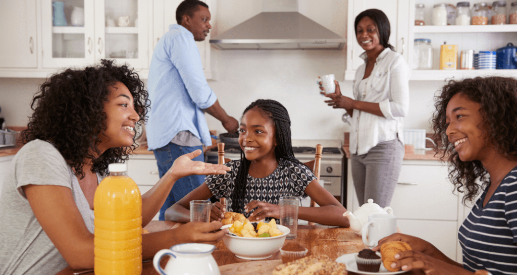 teenagers over breakfast with parents