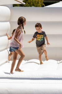 Kids Jumping in Bounce House