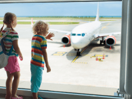 children looking at plane