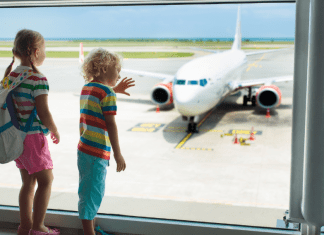 children looking at plane