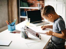 child doing homework online