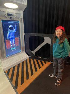 boy in front of mars interactive