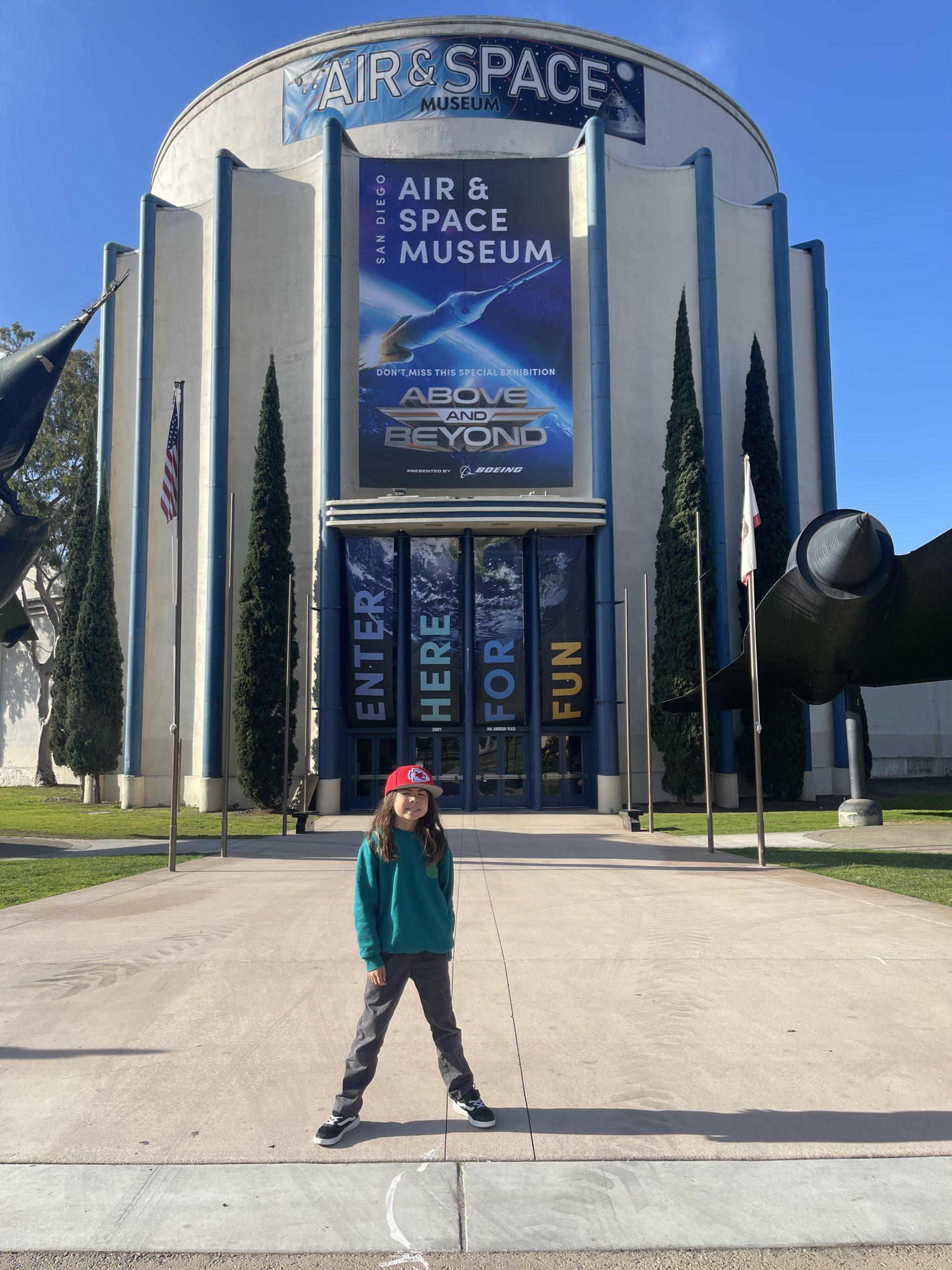 boy in front of space museum