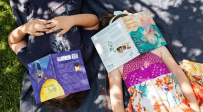 kids reading during homeschooling in summer